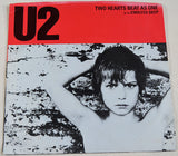 U2 - Two Hearts Beat As One